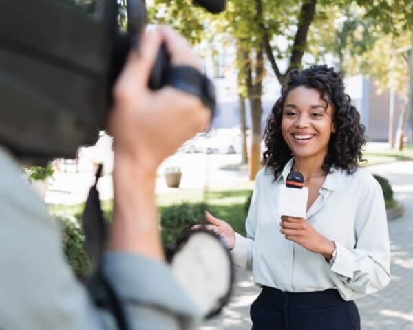 Journalist filmed live in front of broadcast camera